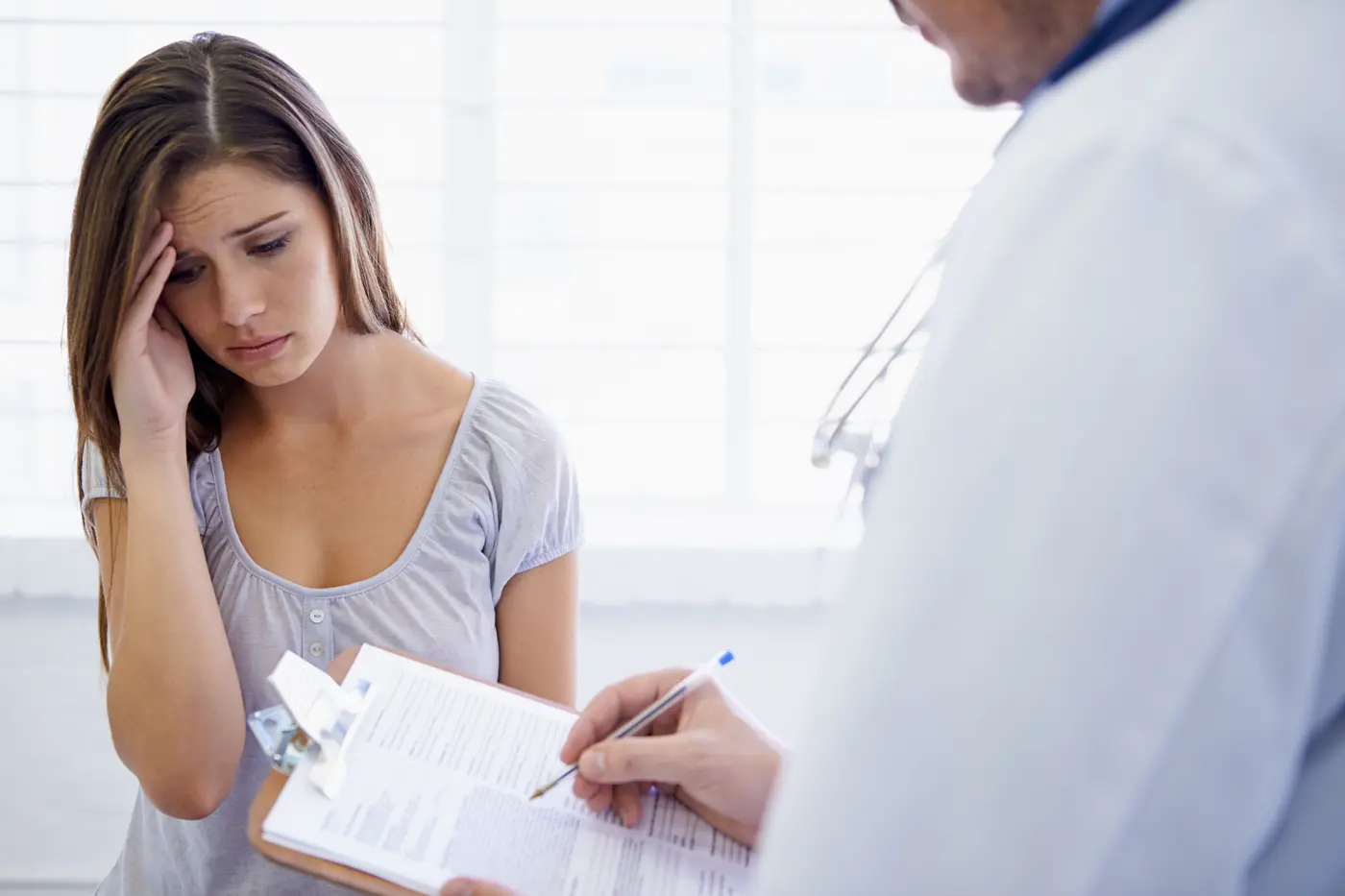 Doctor consulting a patient about participation in a idiopathic hypersomnia clinical trial at Equity Medical
