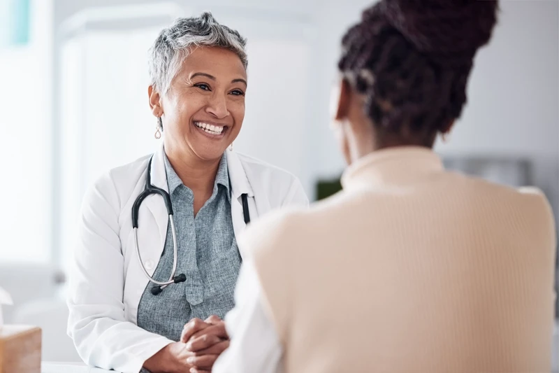 Doctor consulting with a woman at Equity Medical’s Owensboro clinical research location