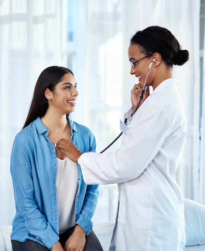 Doctor discussing women’s health clinical studies with a patient at Equity Medical in Owensboro