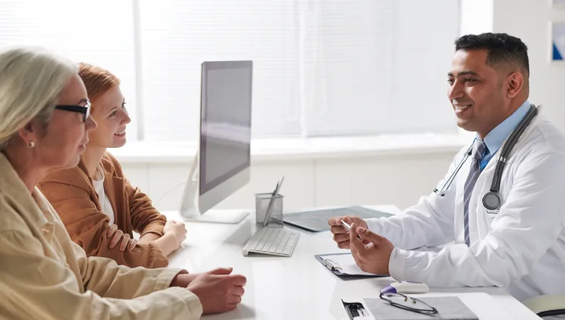 Equity Medical physician reviewing study information with participants