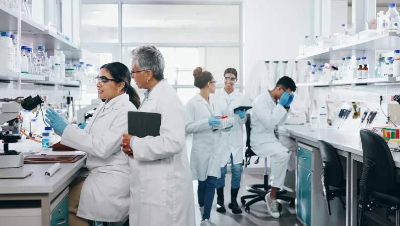 Equity Medical research staff working together in a clinical laboratory